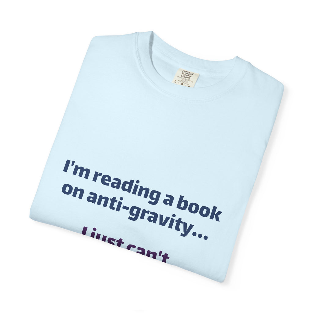 Humor Book Lovers T-Shirt — “I’m reading a book on anti-gravity… I just can’t put it down.”