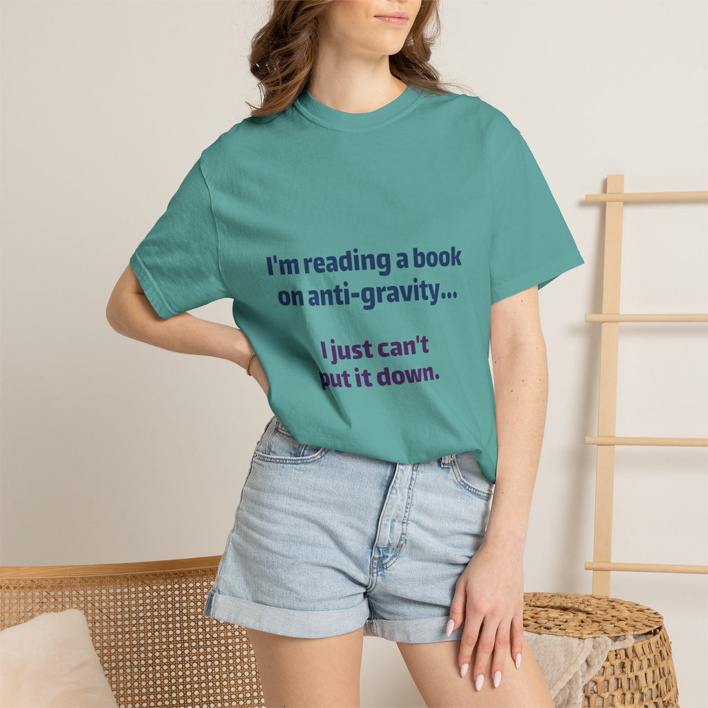 Humor Book Lovers T-Shirt — “I’m reading a book on anti-gravity… I just can’t put it down.”