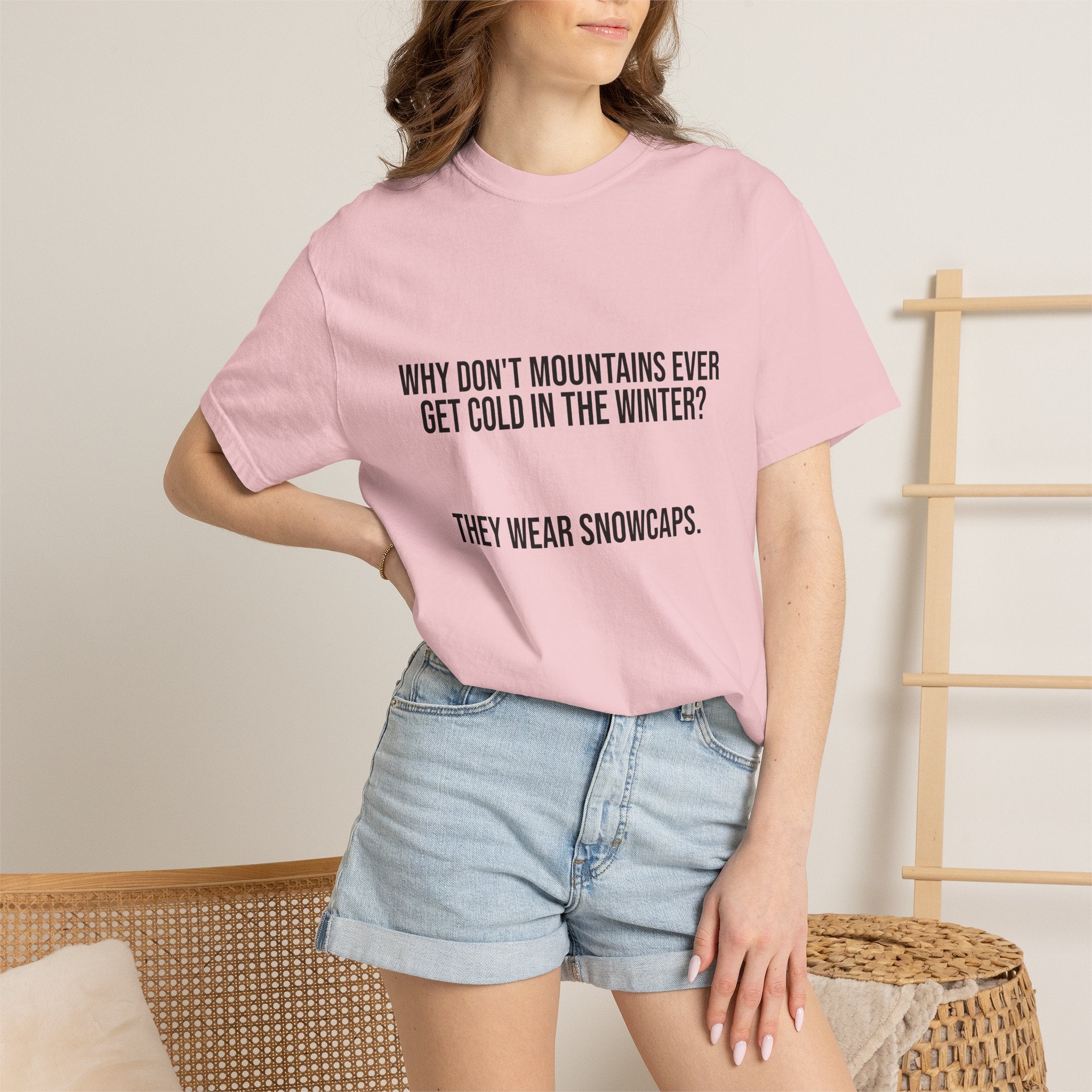 T-Shirt — "Why Don't Mountains Ever Get Cold in the Winter? They Wear Snowcaps." Funny Winter Mountain Tee