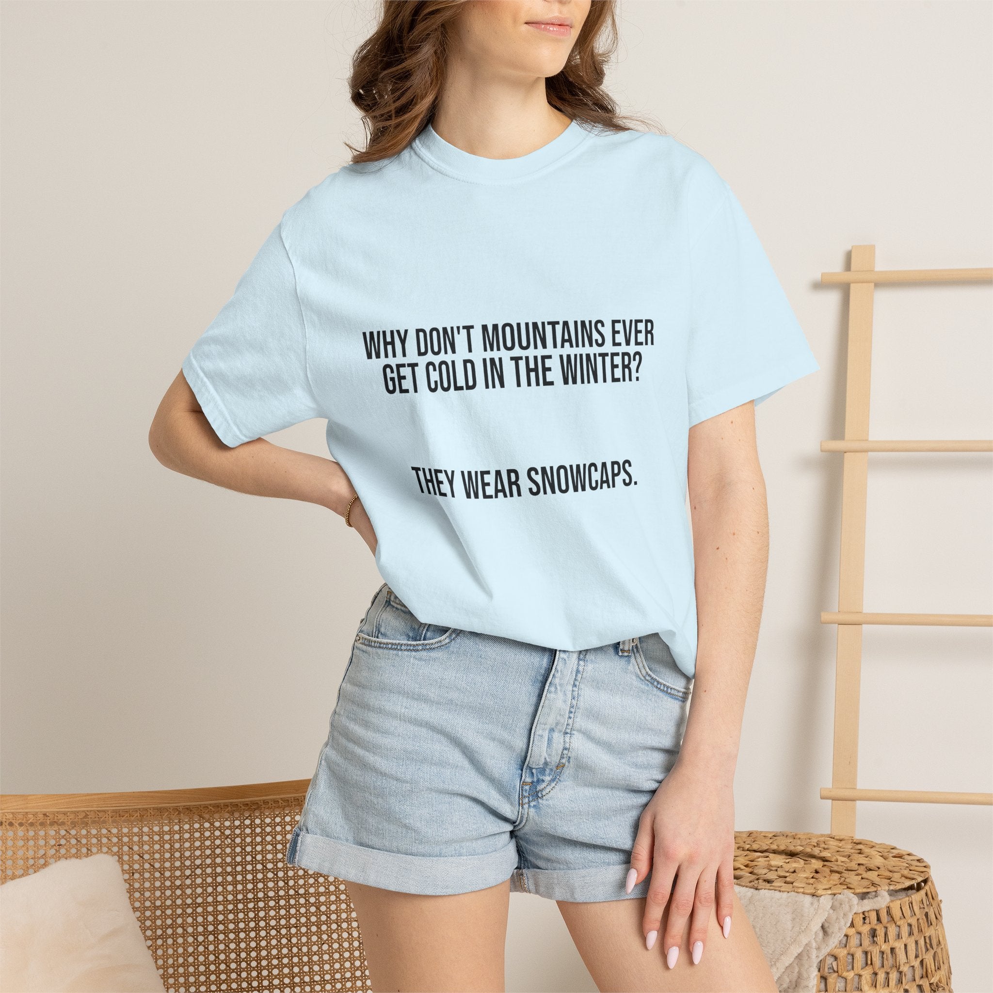 T-Shirt — "Why Don't Mountains Ever Get Cold in the Winter? They Wear Snowcaps." Funny Winter Mountain Tee
