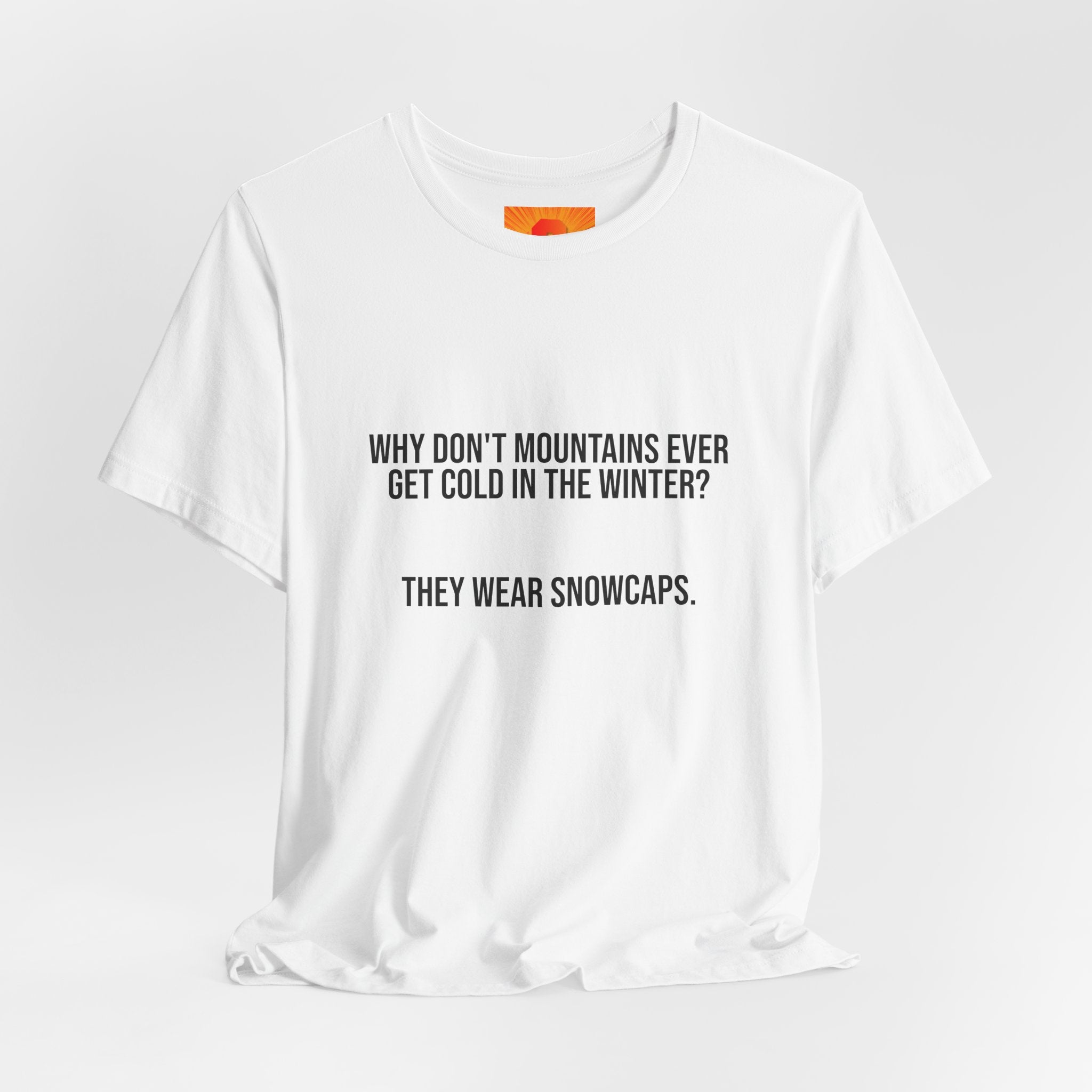 Funny Mountain Joke T-Shirt – “Why Don’t Mountains Ever Get Cold in the Winter? They Wear Snowcaps.”