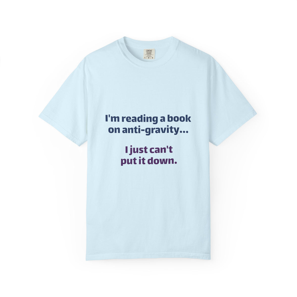Humor Book Lovers T-Shirt — “I’m reading a book on anti-gravity… I just can’t put it down.”