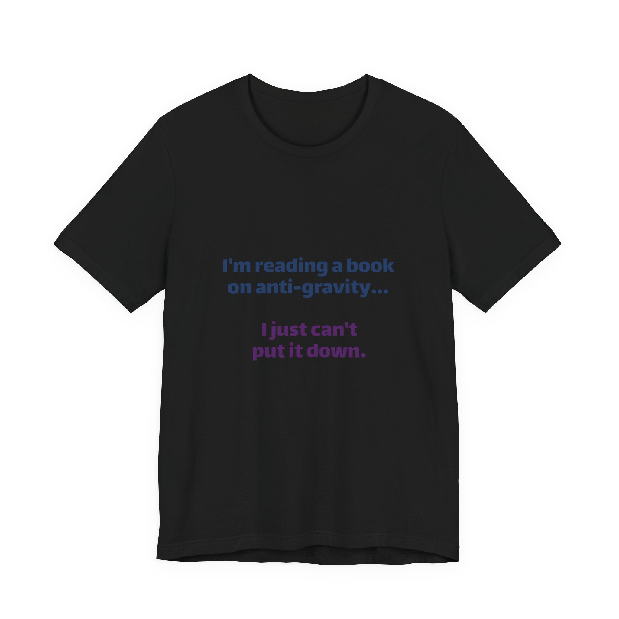 Funny Book Lover T‑Shirt — “I’m reading a book on anti-gravity… I just can’t put it down.”