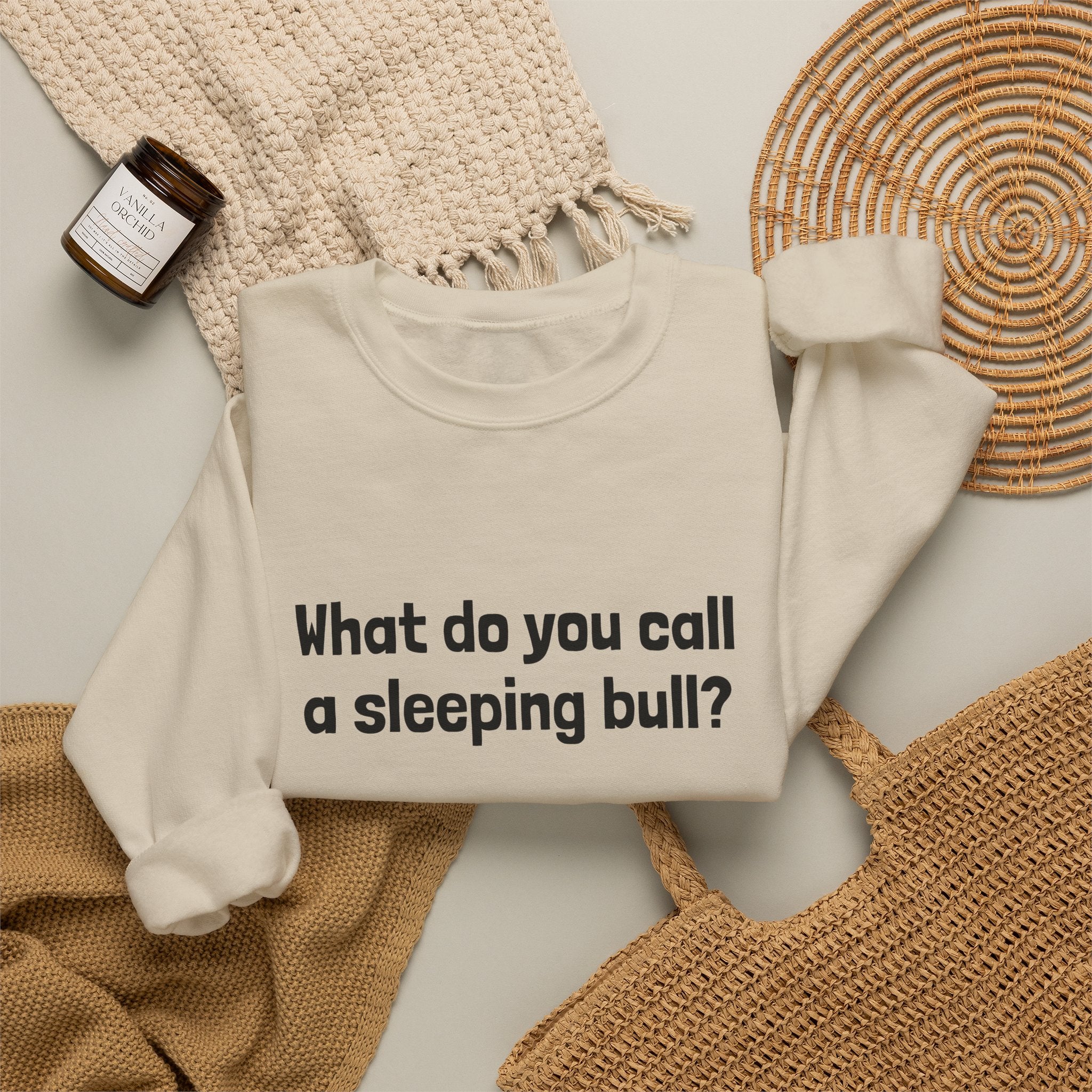 Bulldozer Joke Sweatshirt – “What do you call a sleeping bull? A bulldozer.” Crewneck