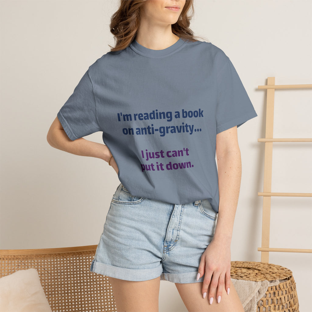 Humor Book Lovers T-Shirt — “I’m reading a book on anti-gravity… I just can’t put it down.”