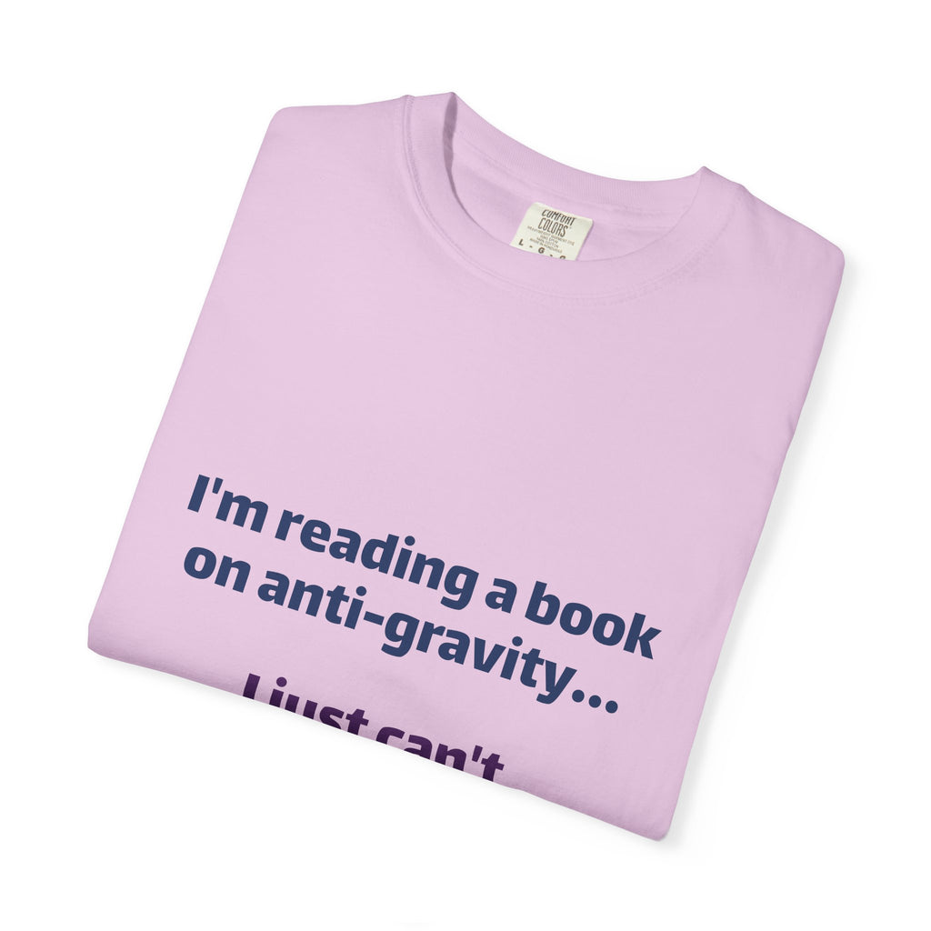 Humor Book Lovers T-Shirt — “I’m reading a book on anti-gravity… I just can’t put it down.”