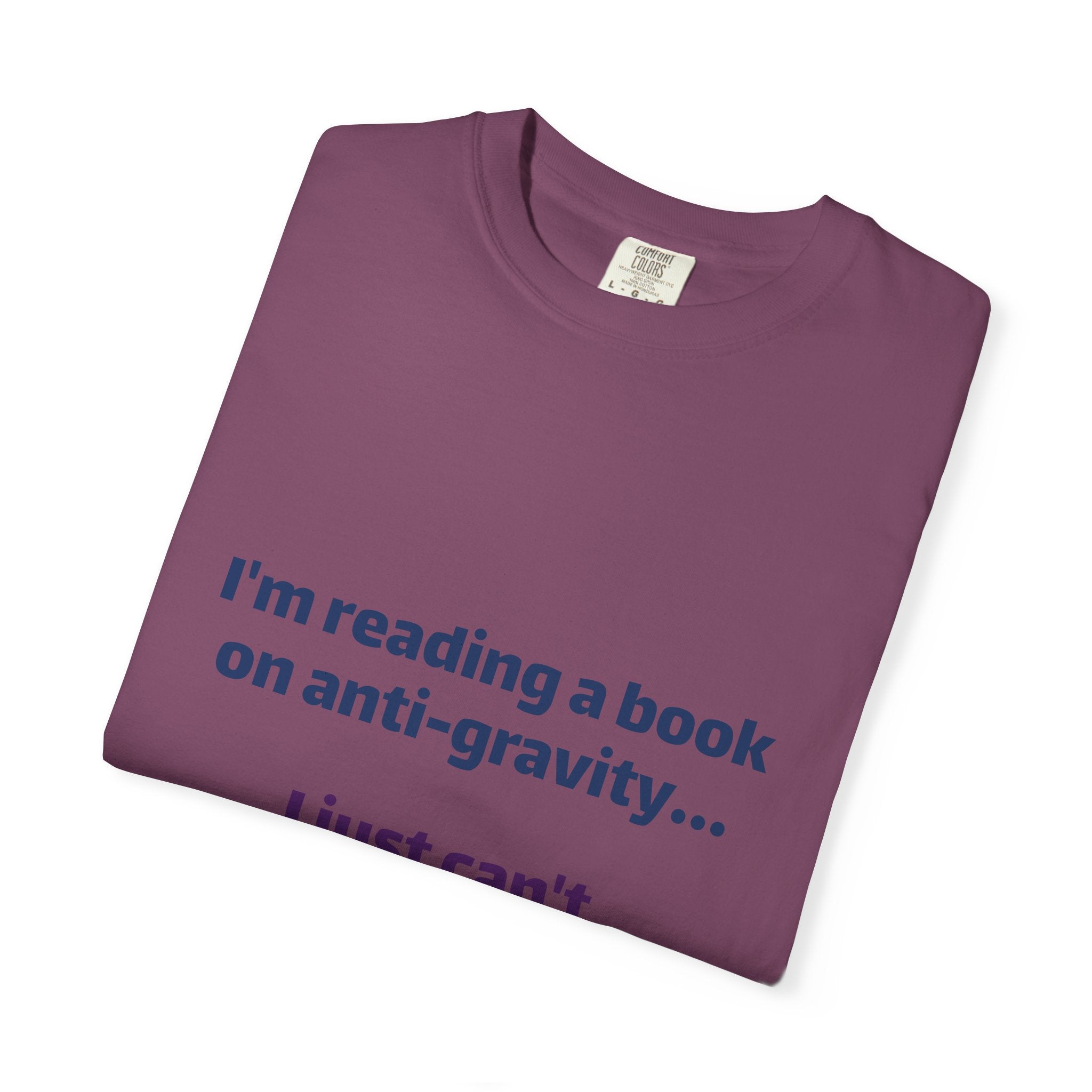 Humor Book Lovers T-Shirt — “I’m reading a book on anti-gravity… I just can’t put it down.”