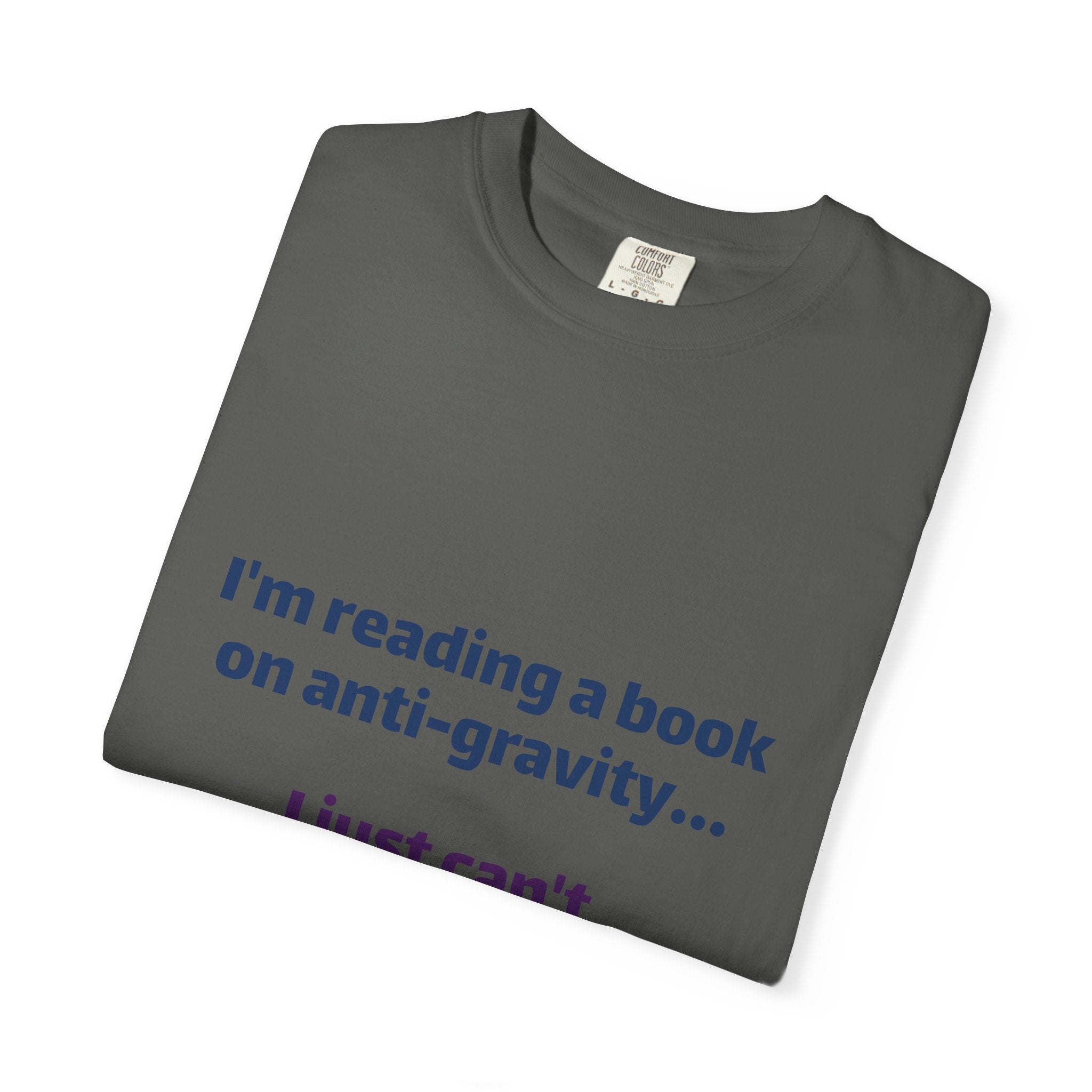 Humor Book Lovers T-Shirt — “I’m reading a book on anti-gravity… I just can’t put it down.”