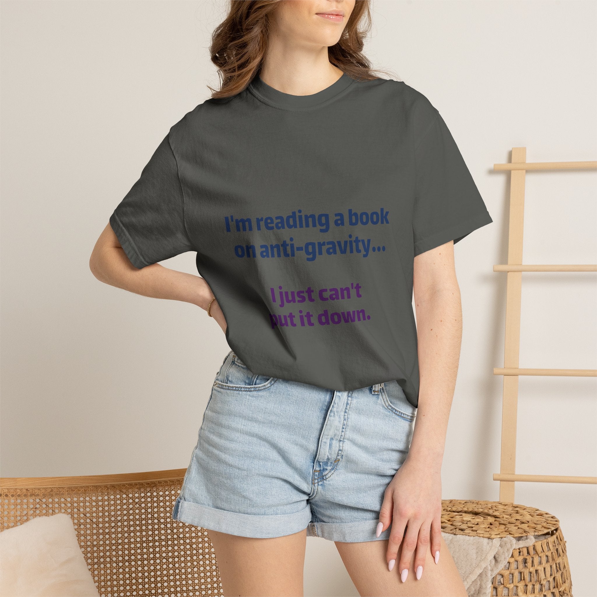 Humor Book Lovers T-Shirt — “I’m reading a book on anti-gravity… I just can’t put it down.”