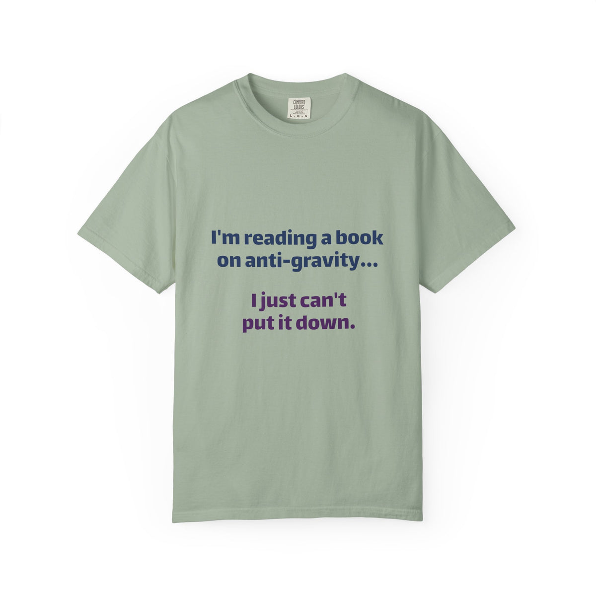 Humor Book Lovers T-Shirt — “I’m reading a book on anti-gravity… I just can’t put it down.”