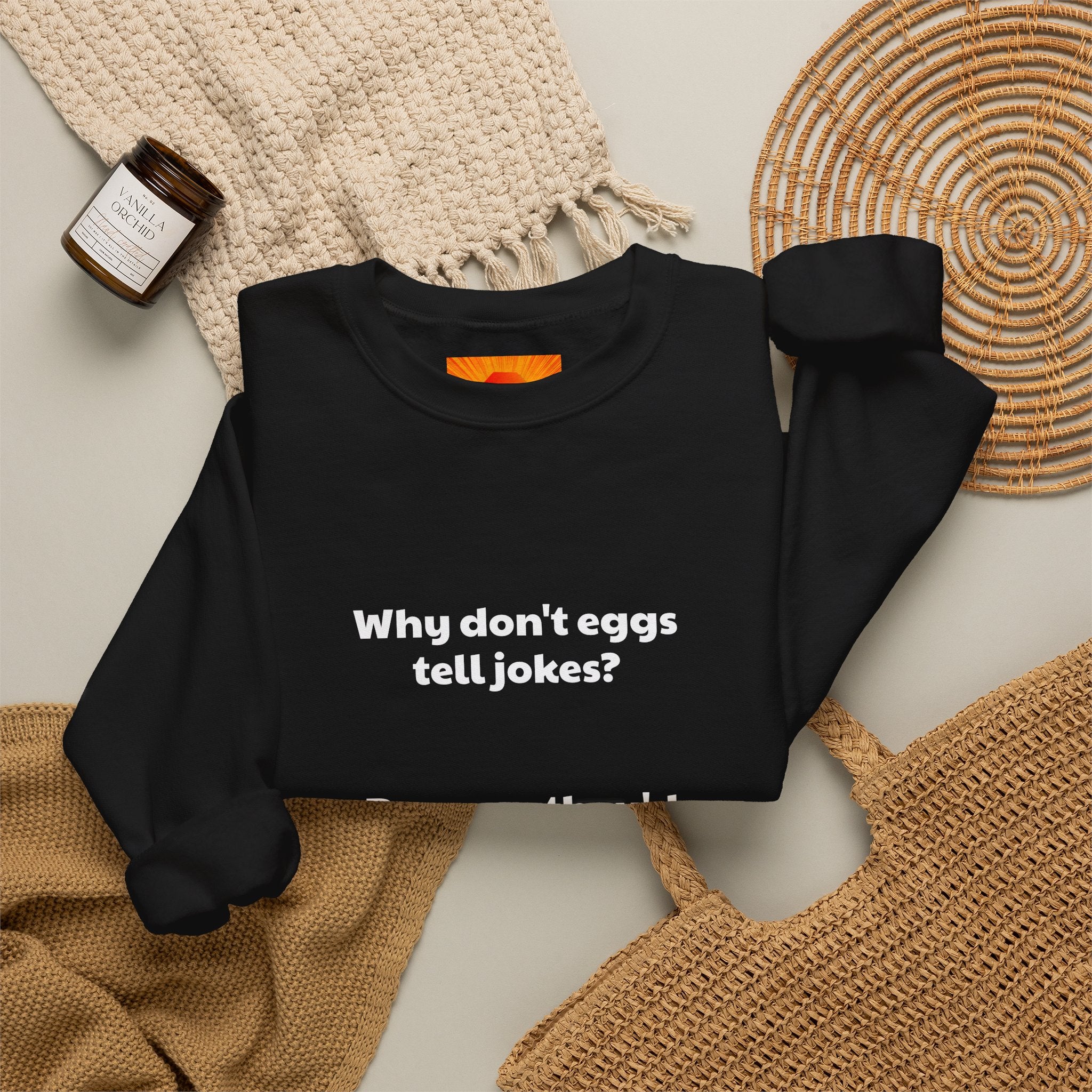 Crewneck Sweatshirt — "Why don't eggs tell jokes? Because they'd crack each other up." Funny Pun Graphic