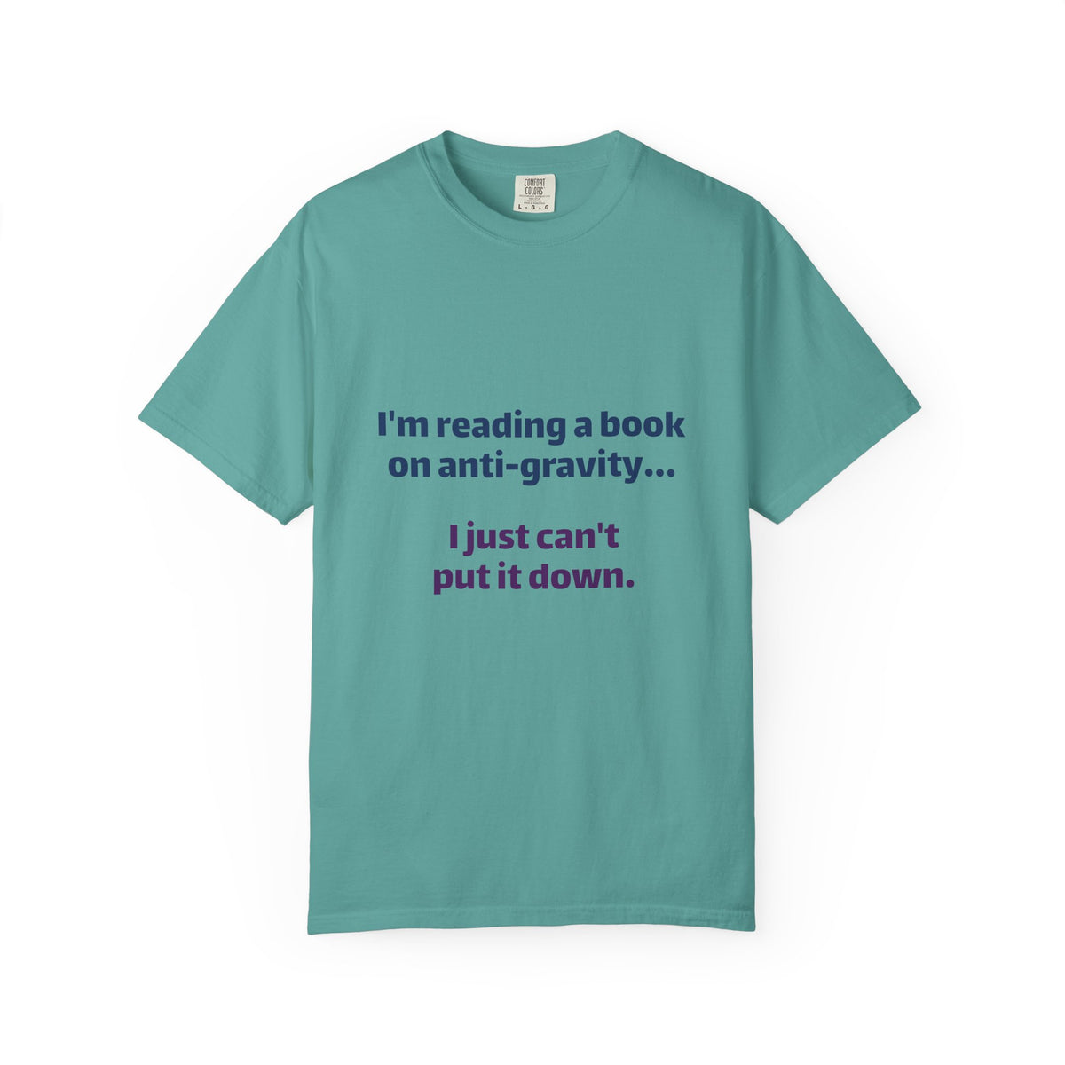 Humor Book Lovers T-Shirt — “I’m reading a book on anti-gravity… I just can’t put it down.”