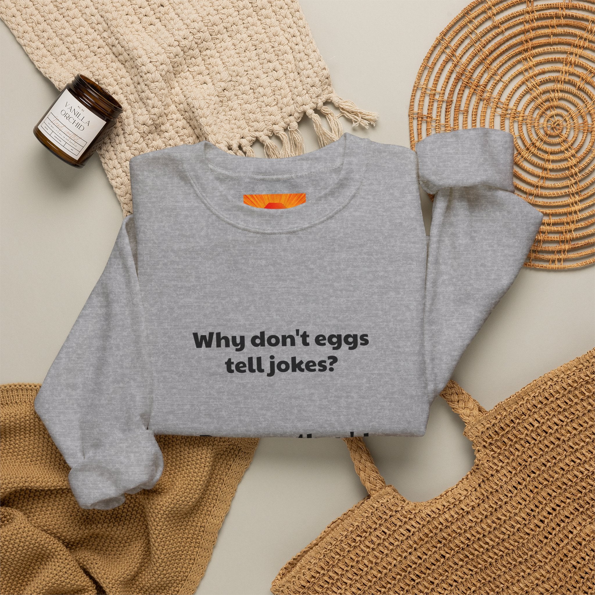 Crewneck Sweatshirt — "Why don't eggs tell jokes? Because they'd crack each other up." Funny Pun Graphic