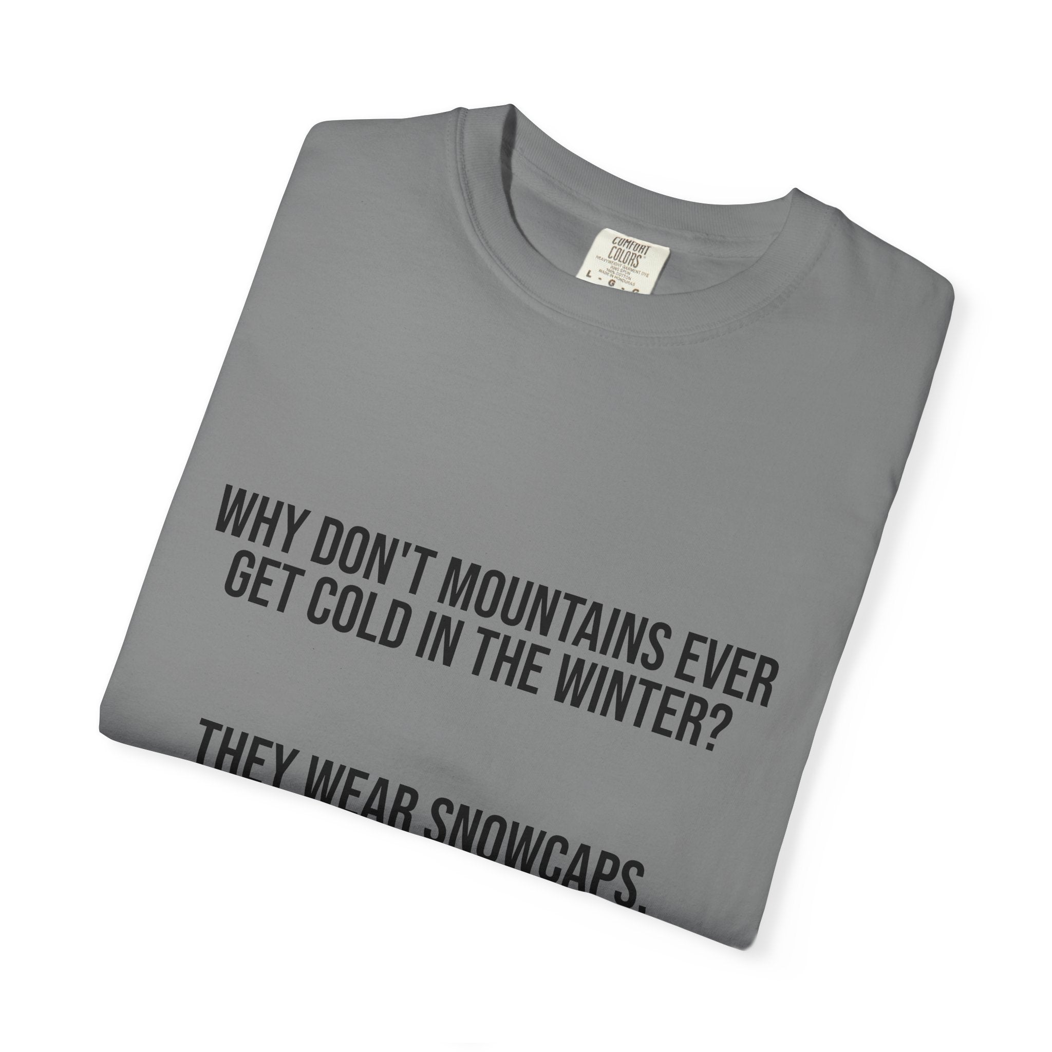 T-Shirt — "Why Don't Mountains Ever Get Cold in the Winter? They Wear Snowcaps." Funny Winter Mountain Tee