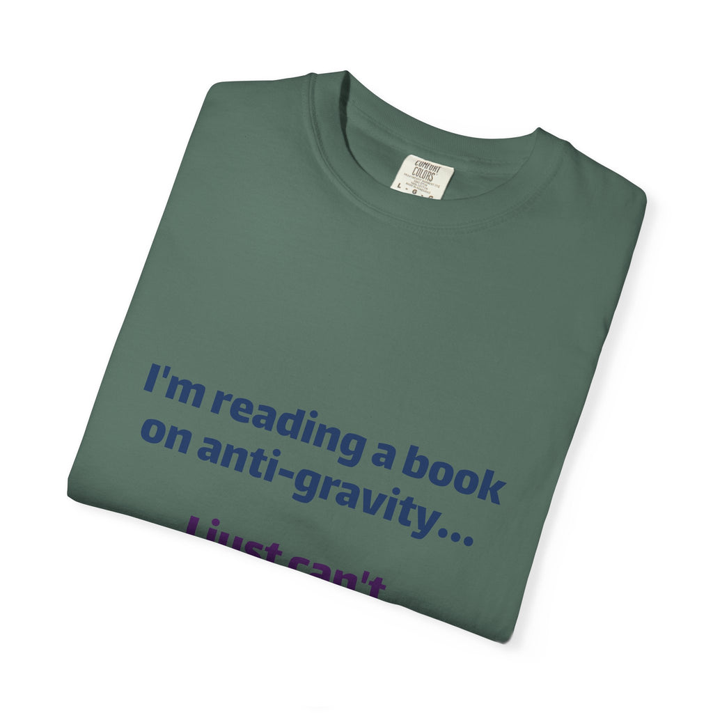 Humor Book Lovers T-Shirt — “I’m reading a book on anti-gravity… I just can’t put it down.”