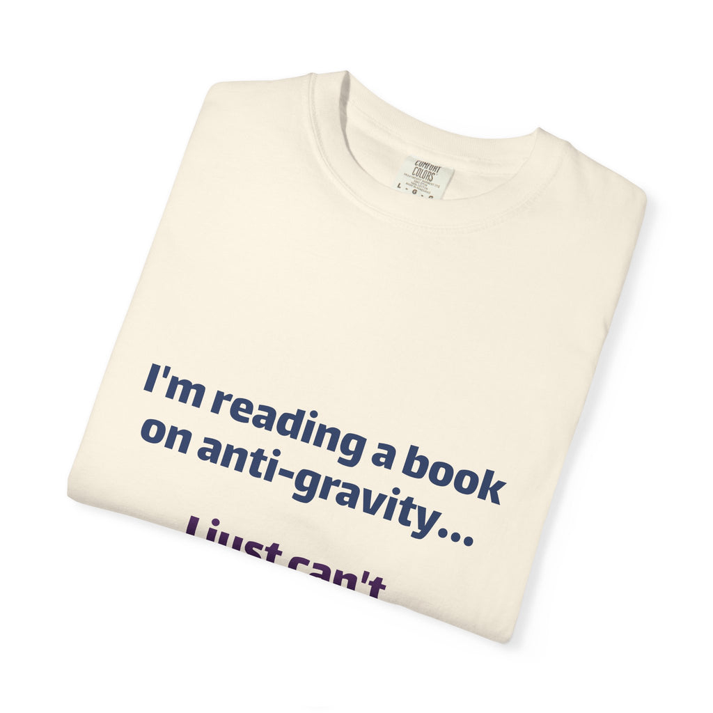 Humor Book Lovers T-Shirt — “I’m reading a book on anti-gravity… I just can’t put it down.”