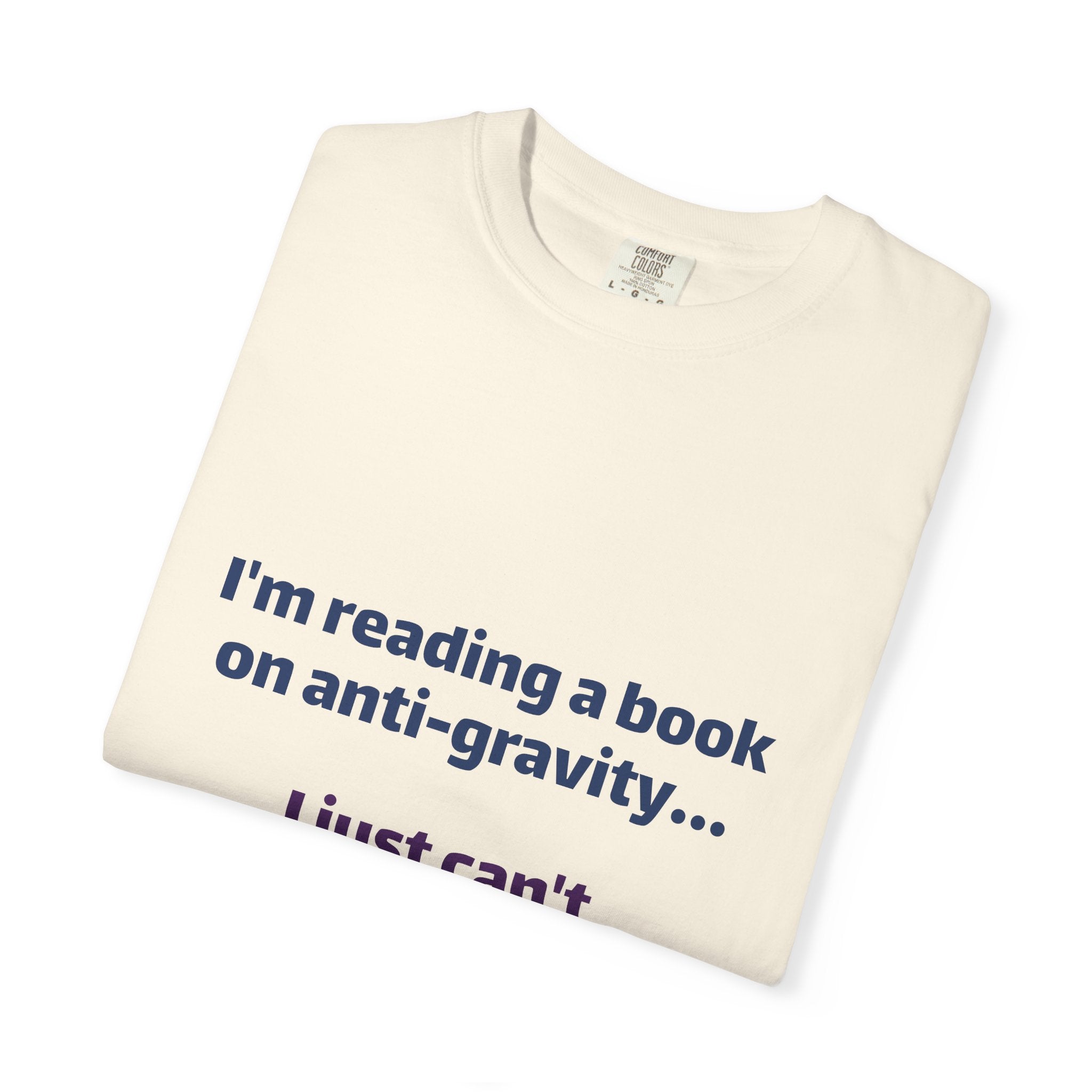 Humor Book Lovers T-Shirt — “I’m reading a book on anti-gravity… I just can’t put it down.”