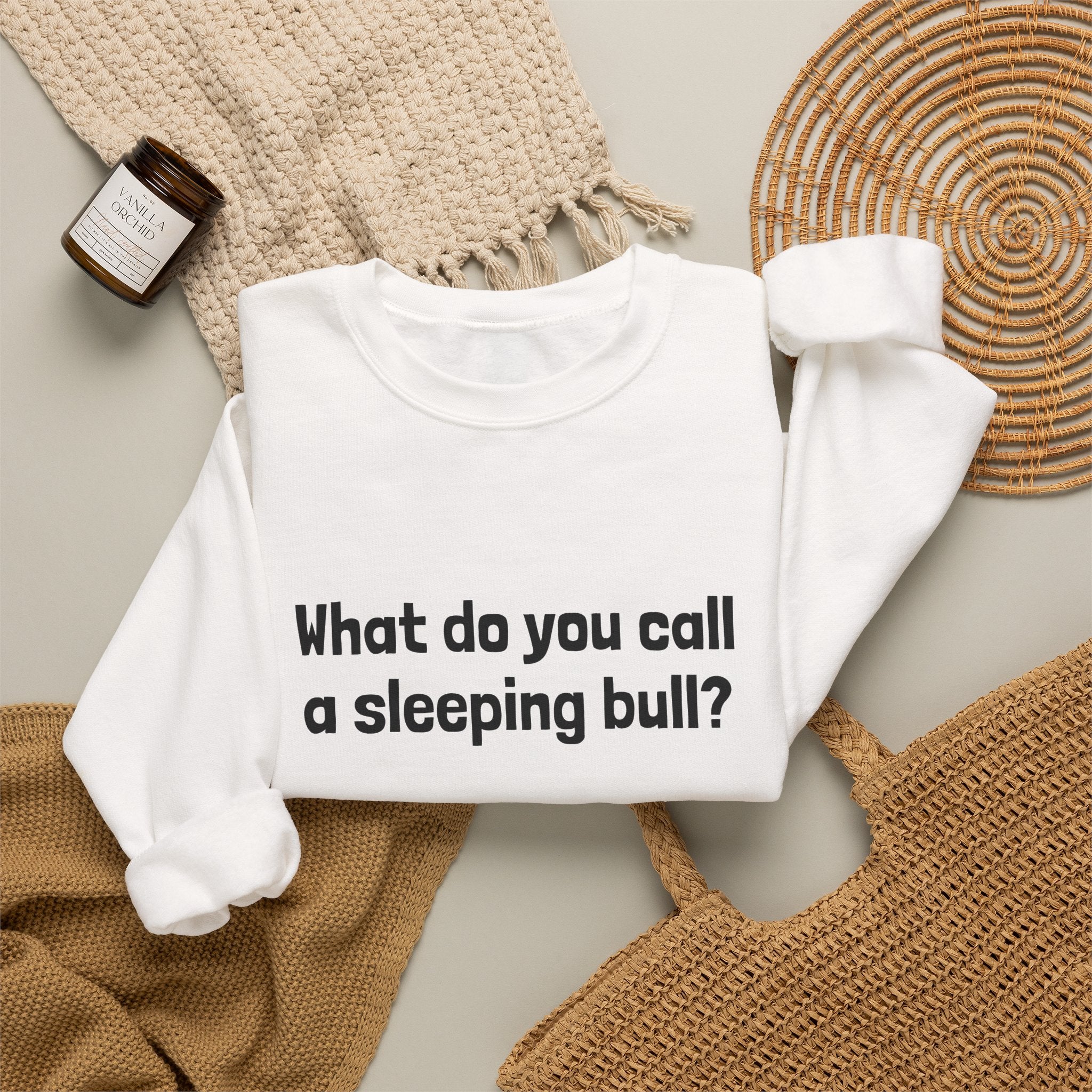 Bulldozer Joke Sweatshirt – “What do you call a sleeping bull? A bulldozer.” Crewneck