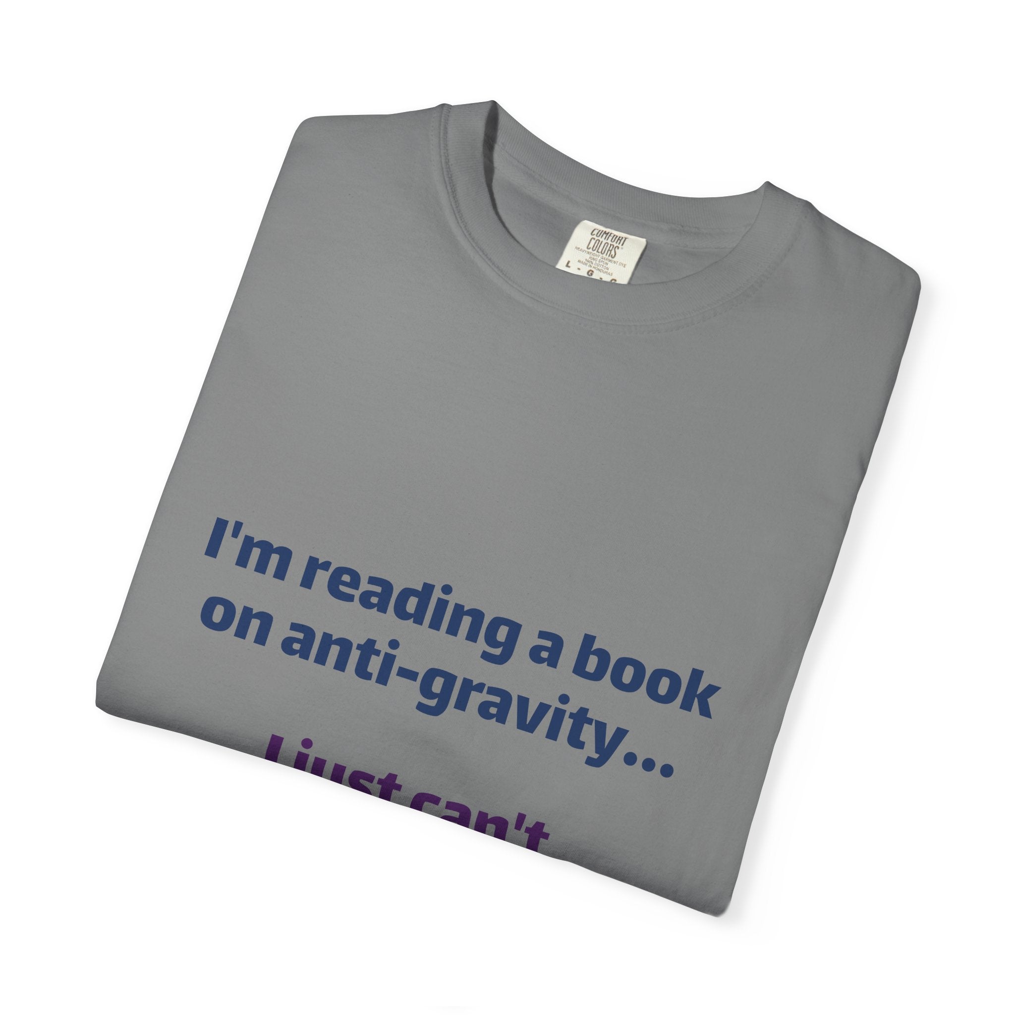 Humor Book Lovers T-Shirt — “I’m reading a book on anti-gravity… I just can’t put it down.”