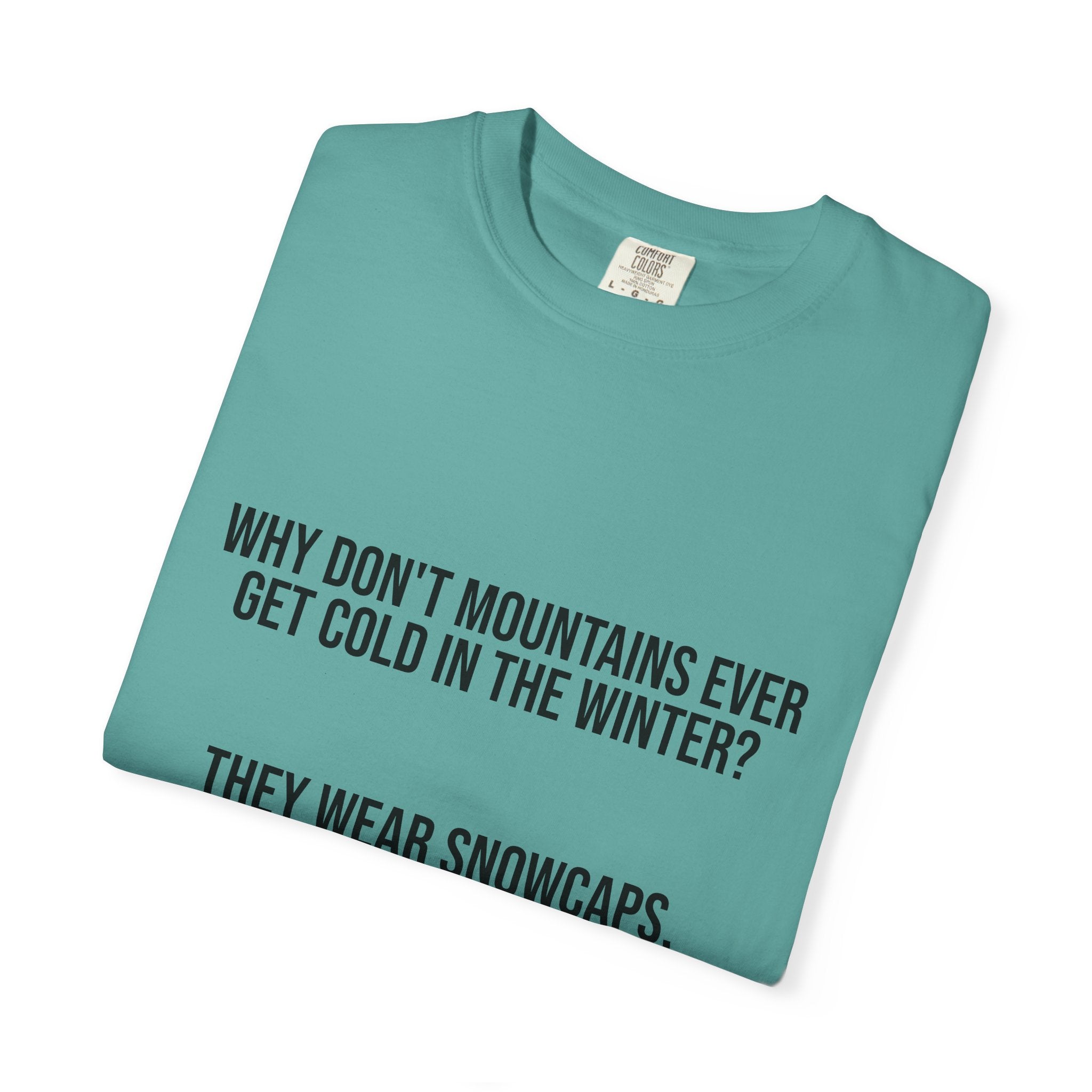 T-Shirt — "Why Don't Mountains Ever Get Cold in the Winter? They Wear Snowcaps." Funny Winter Mountain Tee