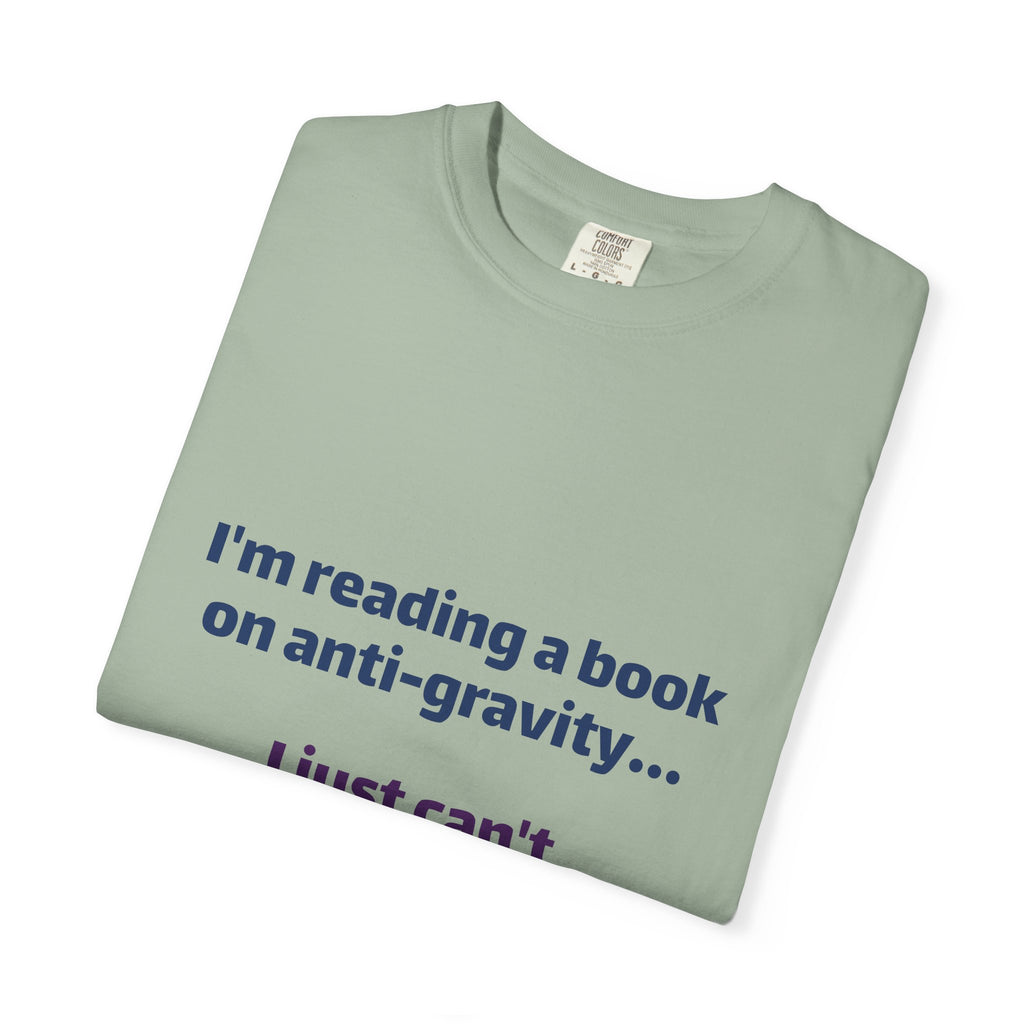 Humor Book Lovers T-Shirt — “I’m reading a book on anti-gravity… I just can’t put it down.”