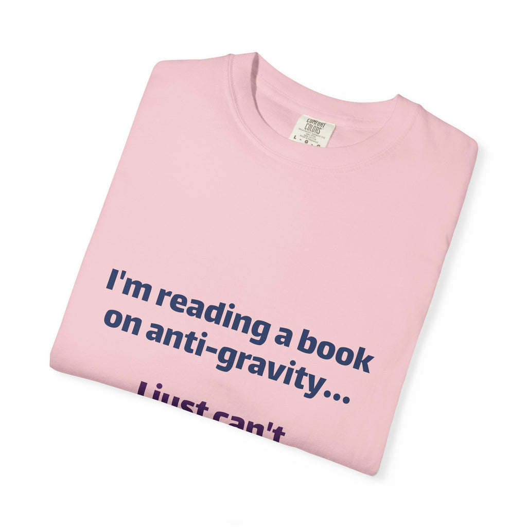 Humor Book Lovers T-Shirt — “I’m reading a book on anti-gravity… I just can’t put it down.”