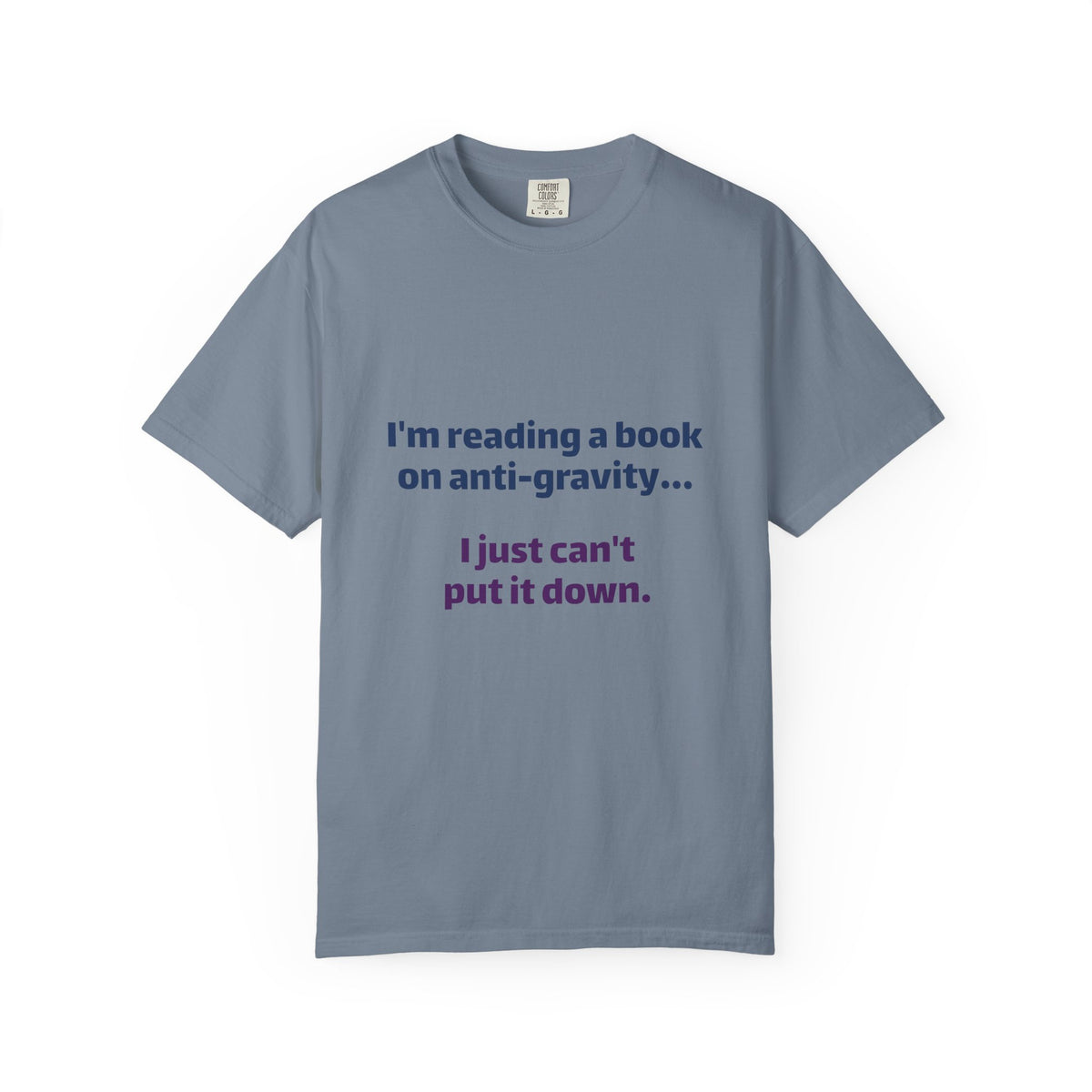 Humor Book Lovers T-Shirt — “I’m reading a book on anti-gravity… I just can’t put it down.”