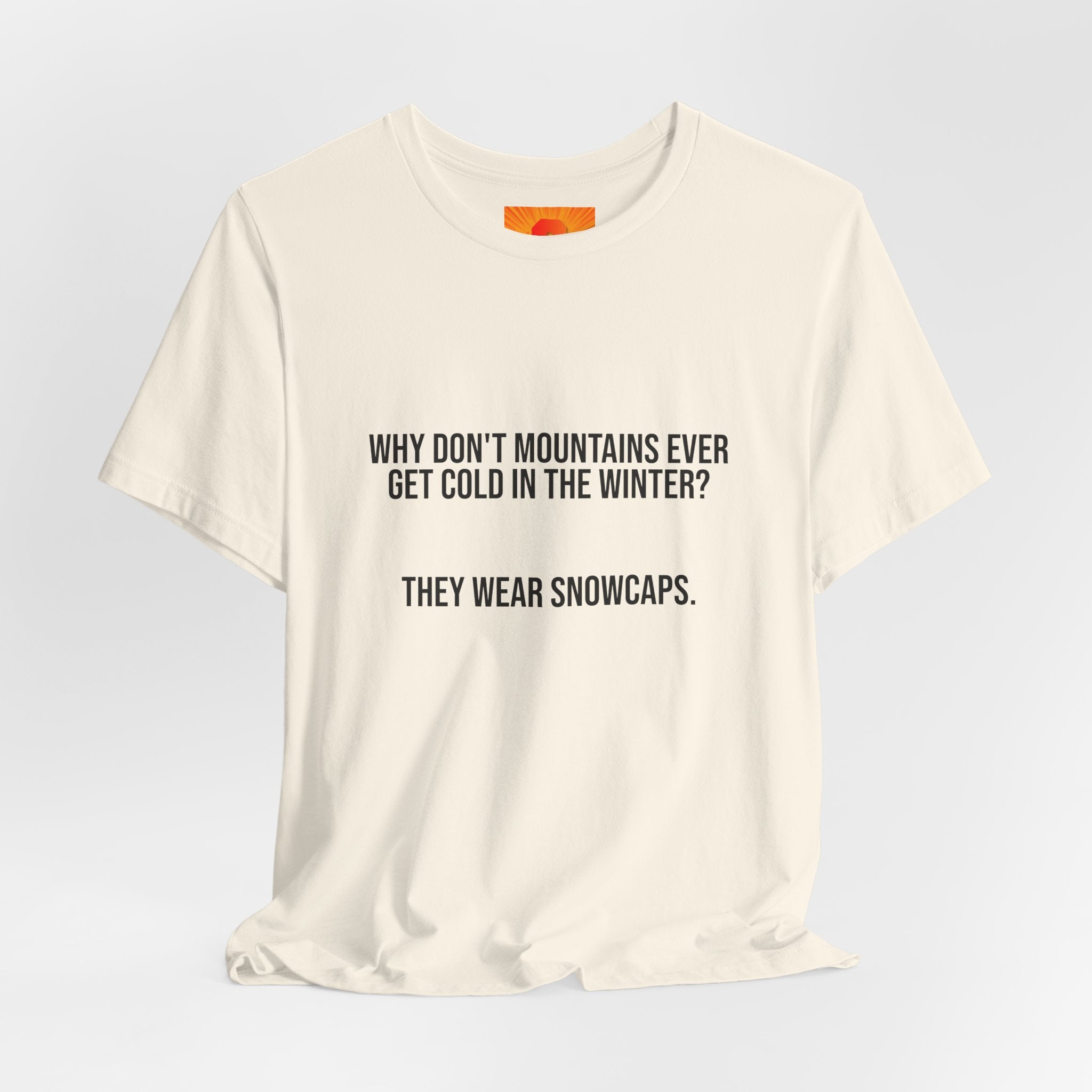 Funny Mountain Joke T-Shirt – “Why Don’t Mountains Ever Get Cold in the Winter? They Wear Snowcaps.”