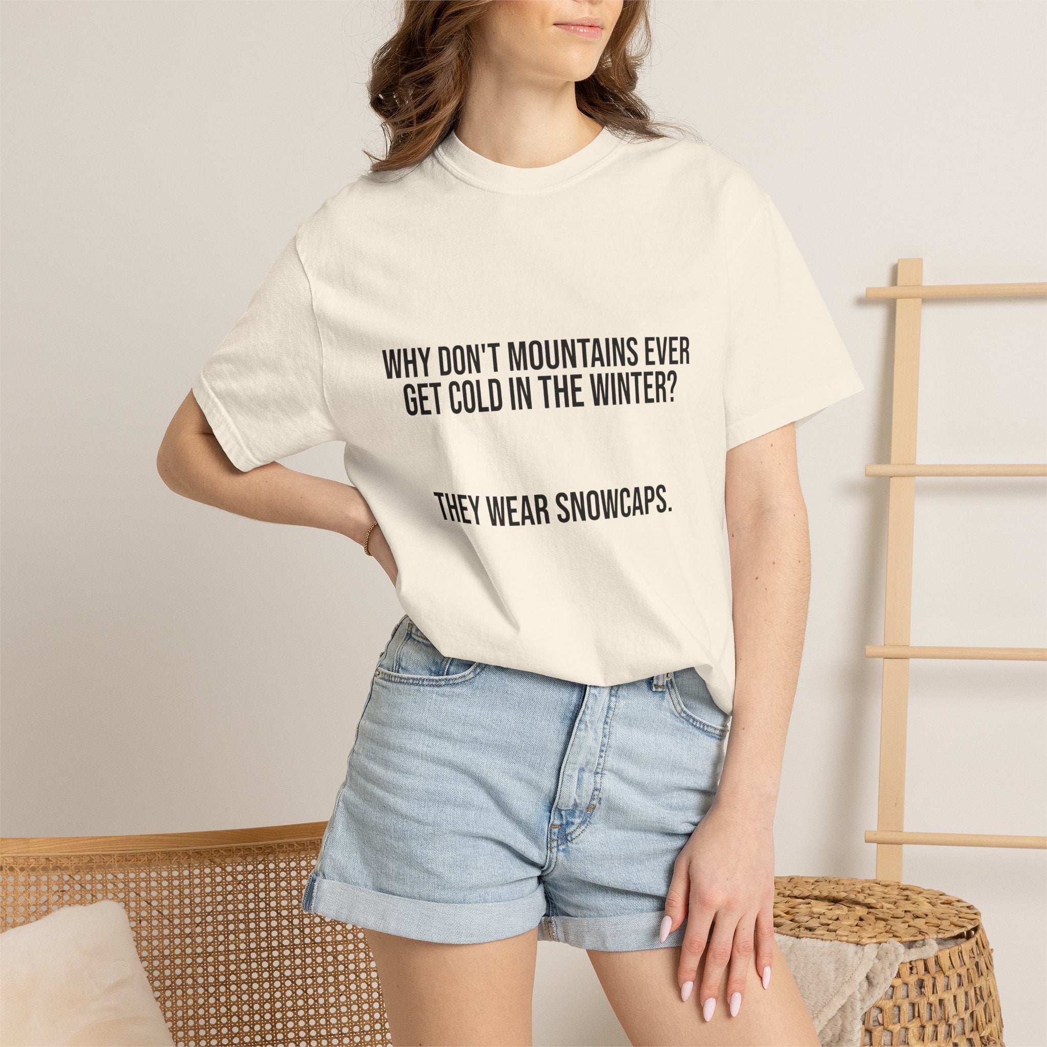 T-Shirt — "Why Don't Mountains Ever Get Cold in the Winter? They Wear Snowcaps." Funny Winter Mountain Tee