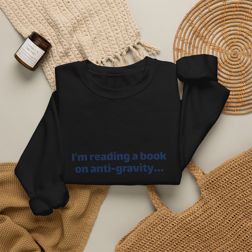 Crewneck Sweatshirt – Funny Book Nerd Quote: "I'm reading a book on anti-gravity... I just can't put it down."