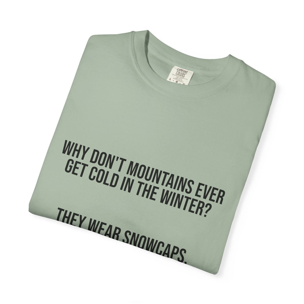 T-Shirt — "Why Don't Mountains Ever Get Cold in the Winter? They Wear Snowcaps." Funny Winter Mountain Tee