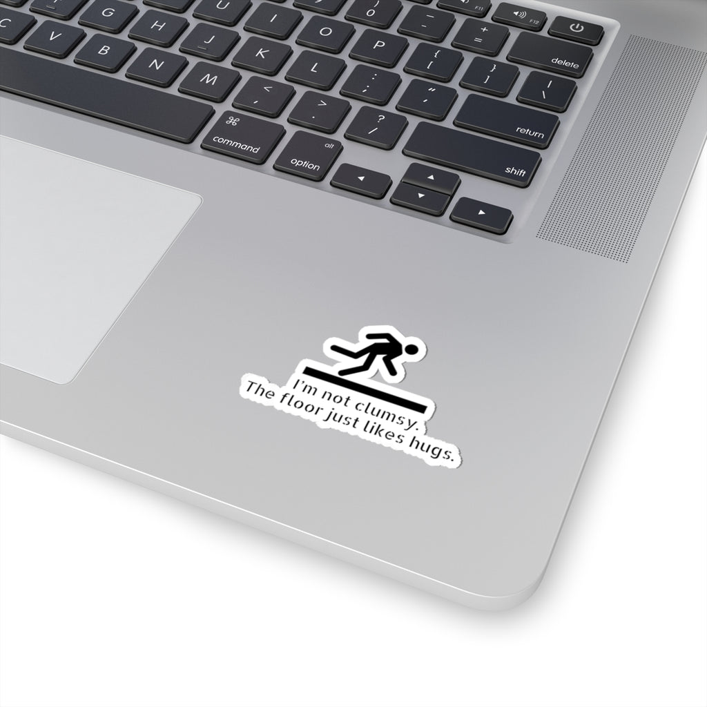 Funny Clumsy Sticker — “I’m not clumsy. The floor just likes hugs.” Kiss-Cut Laptop Decal