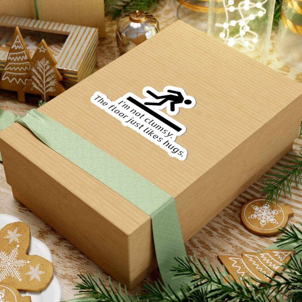 Funny Clumsy Sticker — “I’m not clumsy. The floor just likes hugs.” Kiss-Cut Laptop Decal