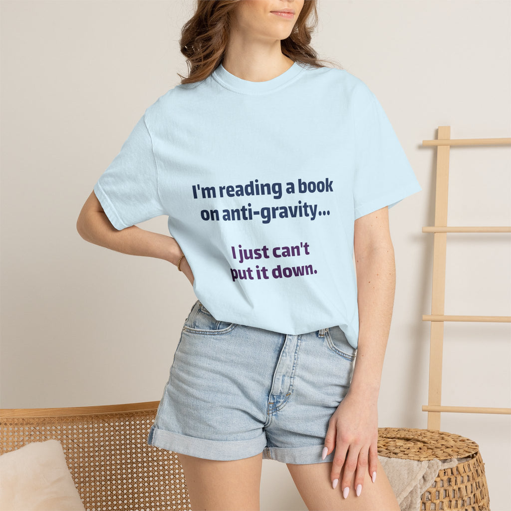 Humor Book Lovers T-Shirt — “I’m reading a book on anti-gravity… I just can’t put it down.”