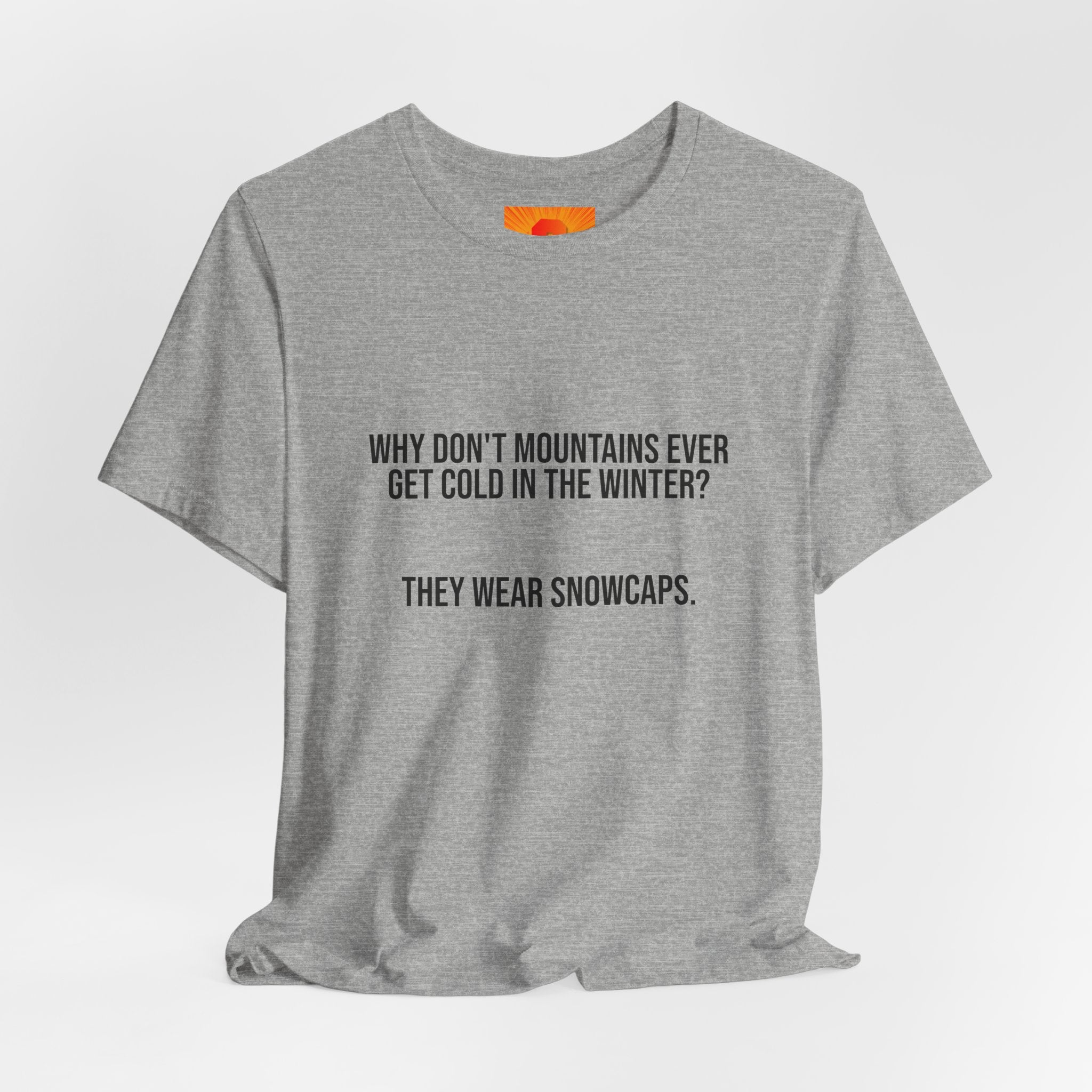Funny Mountain Joke T-Shirt – “Why Don’t Mountains Ever Get Cold in the Winter? They Wear Snowcaps.”