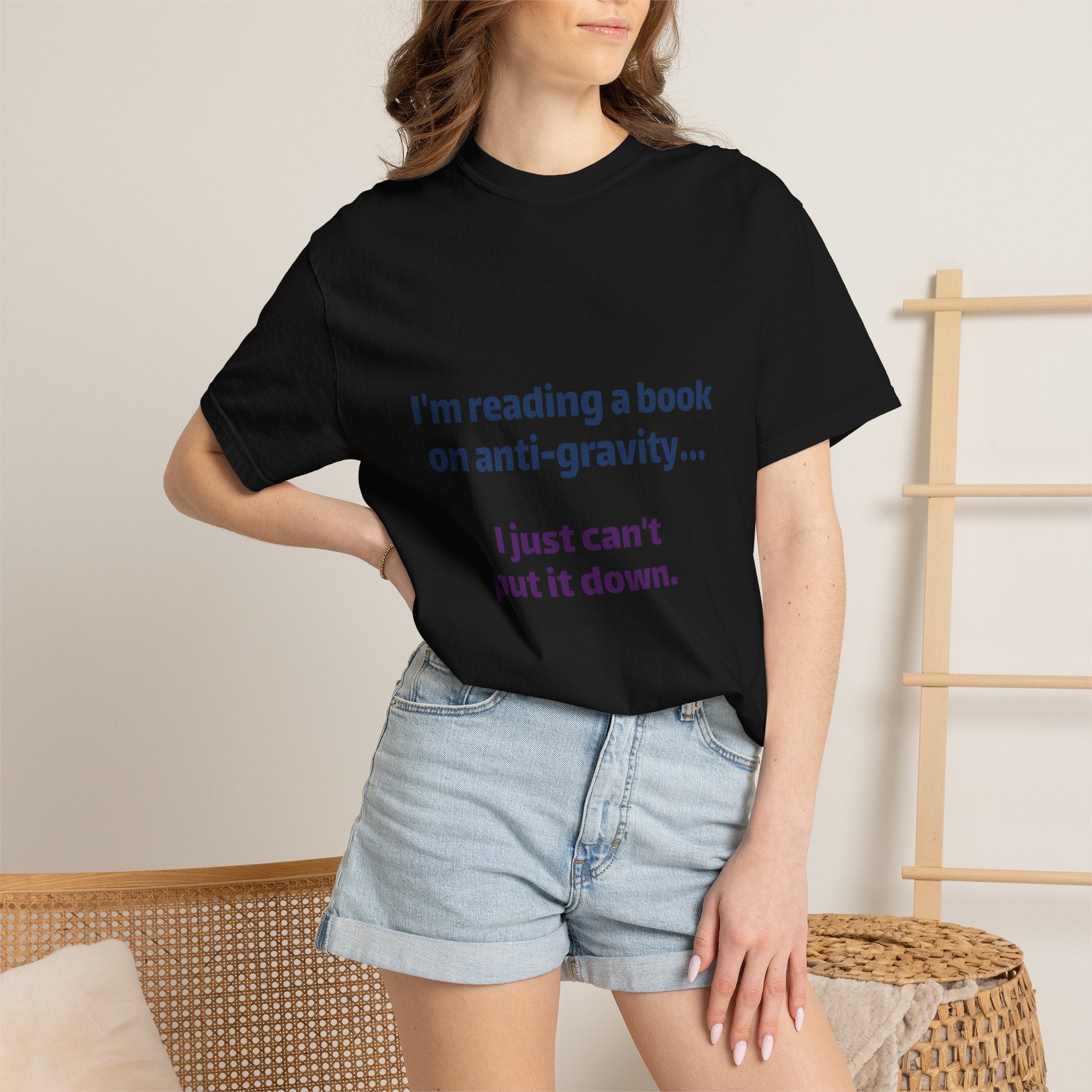 Humor Book Lovers T-Shirt — “I’m reading a book on anti-gravity… I just can’t put it down.”