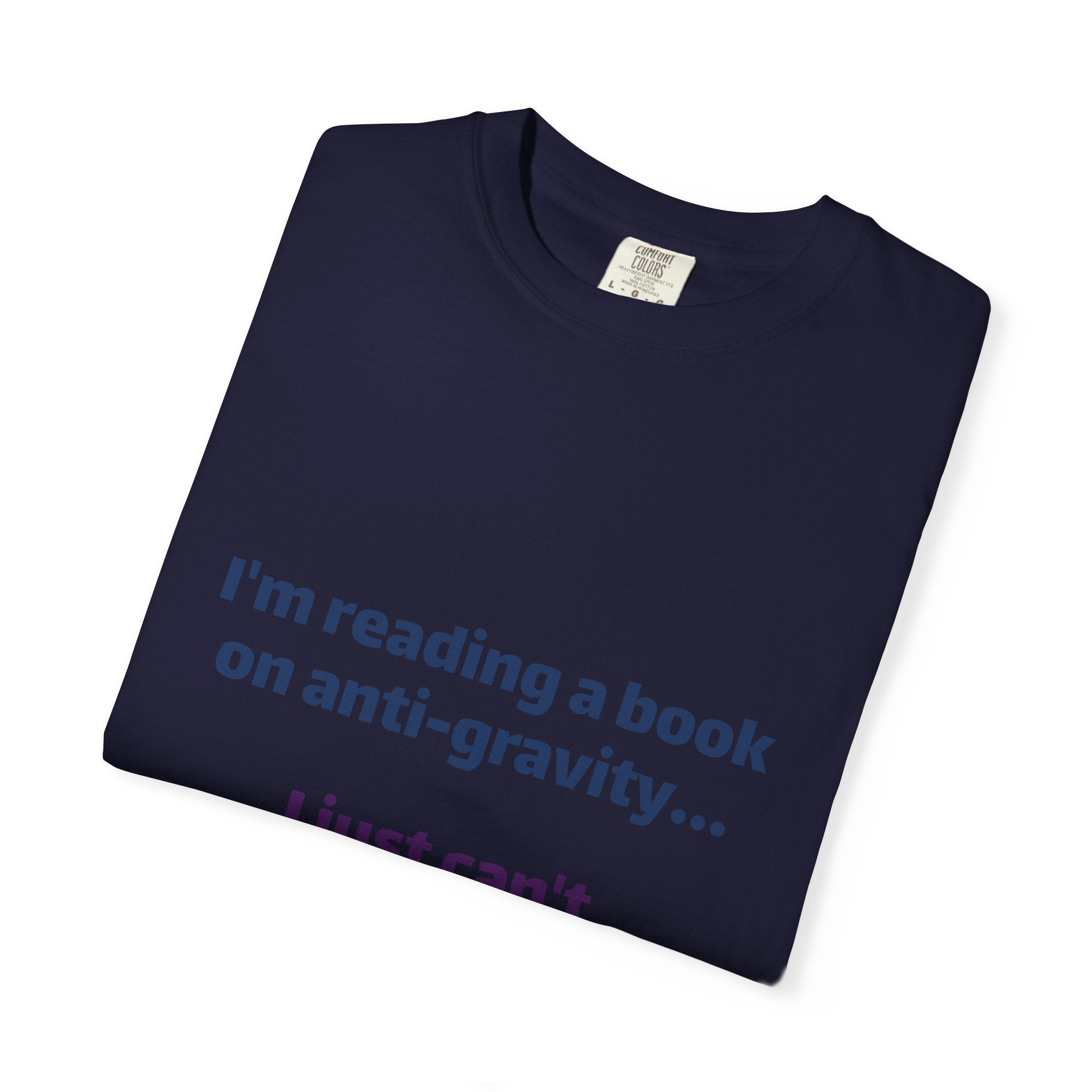 Humor Book Lovers T-Shirt — “I’m reading a book on anti-gravity… I just can’t put it down.”