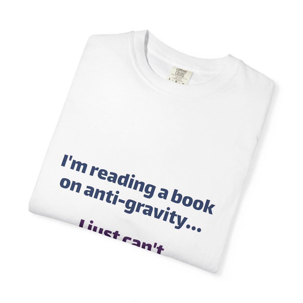Humor Book Lovers T-Shirt — “I’m reading a book on anti-gravity… I just can’t put it down.”