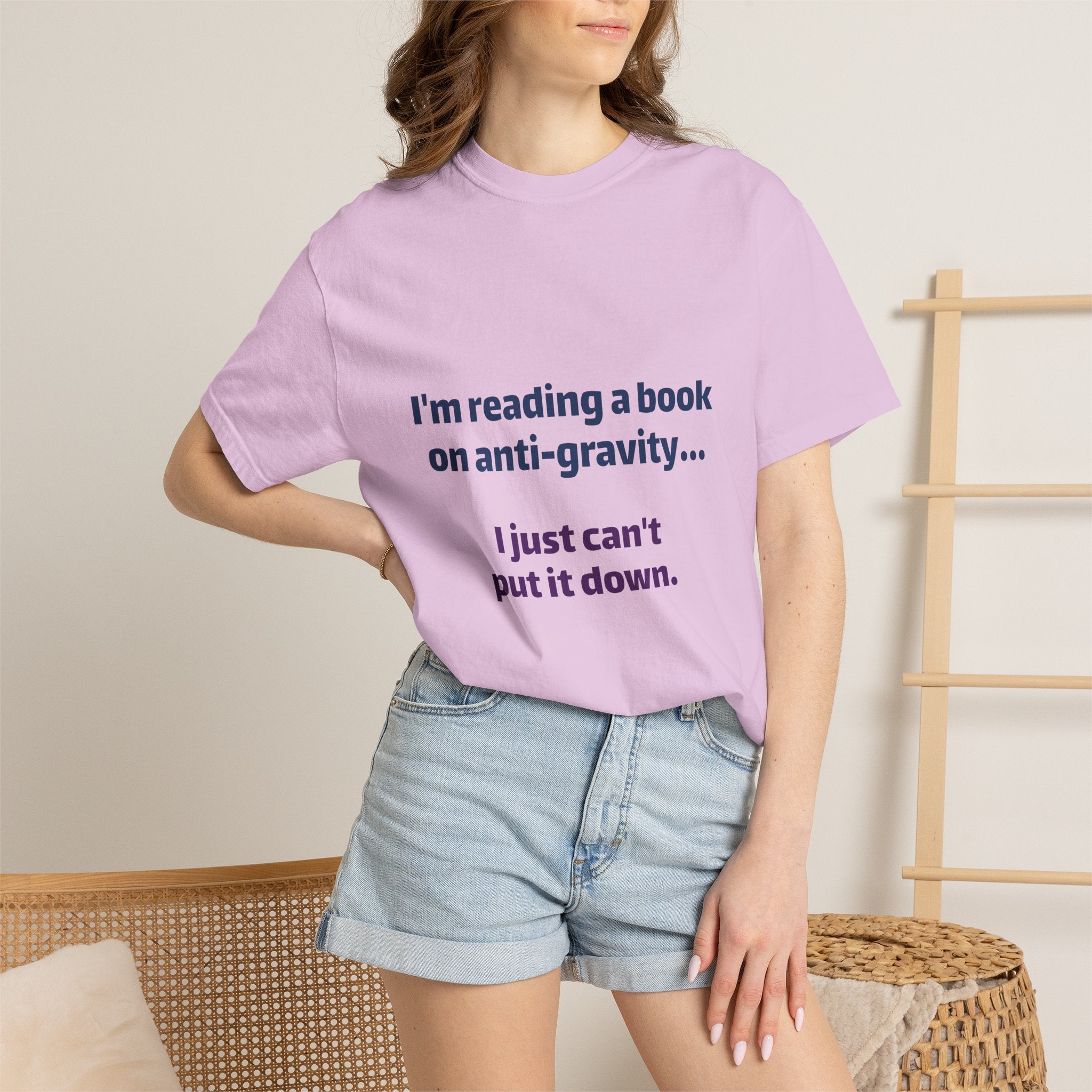 Humor Book Lovers T-Shirt — “I’m reading a book on anti-gravity… I just can’t put it down.”