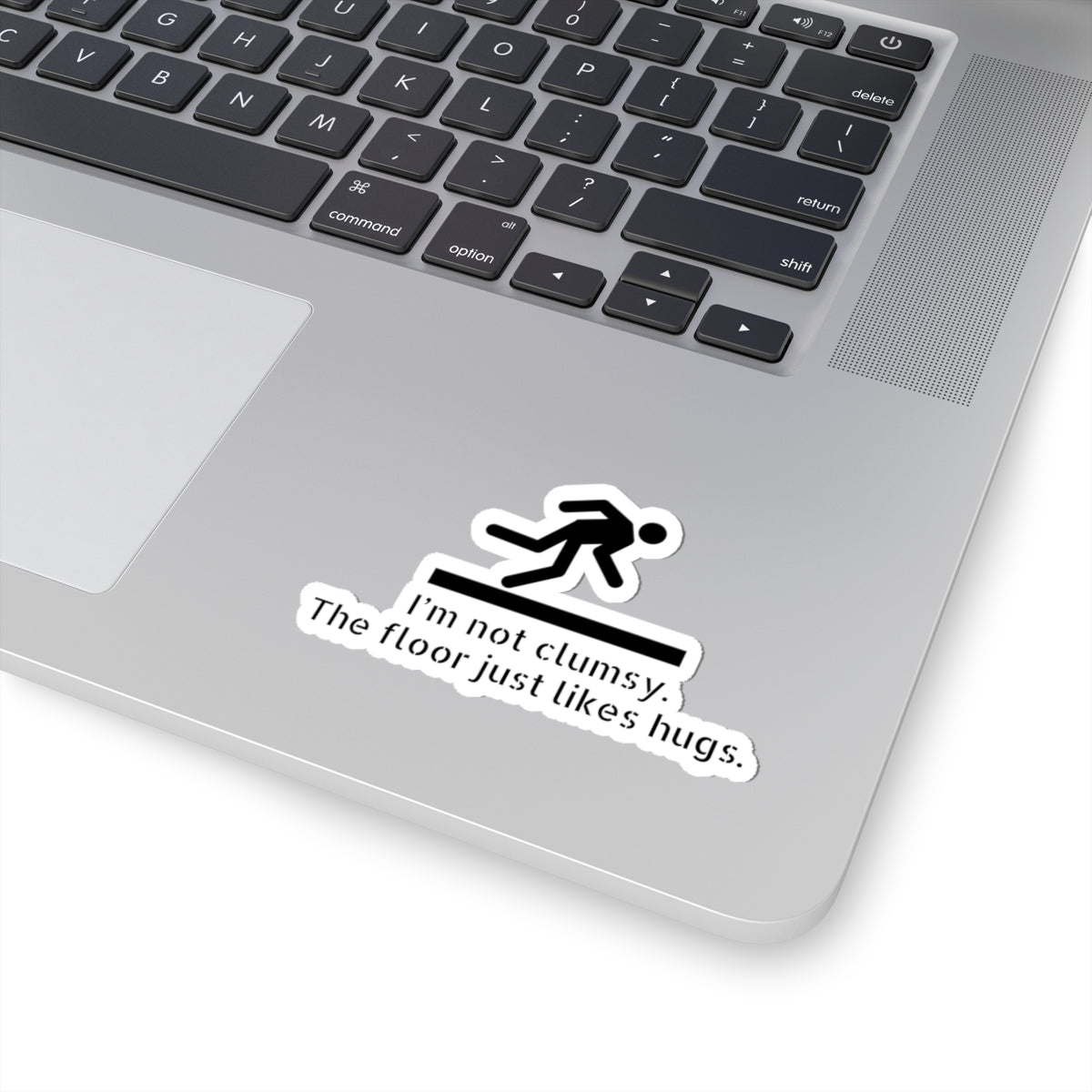 Funny Clumsy Sticker — “I’m not clumsy. The floor just likes hugs.” Kiss-Cut Laptop Decal