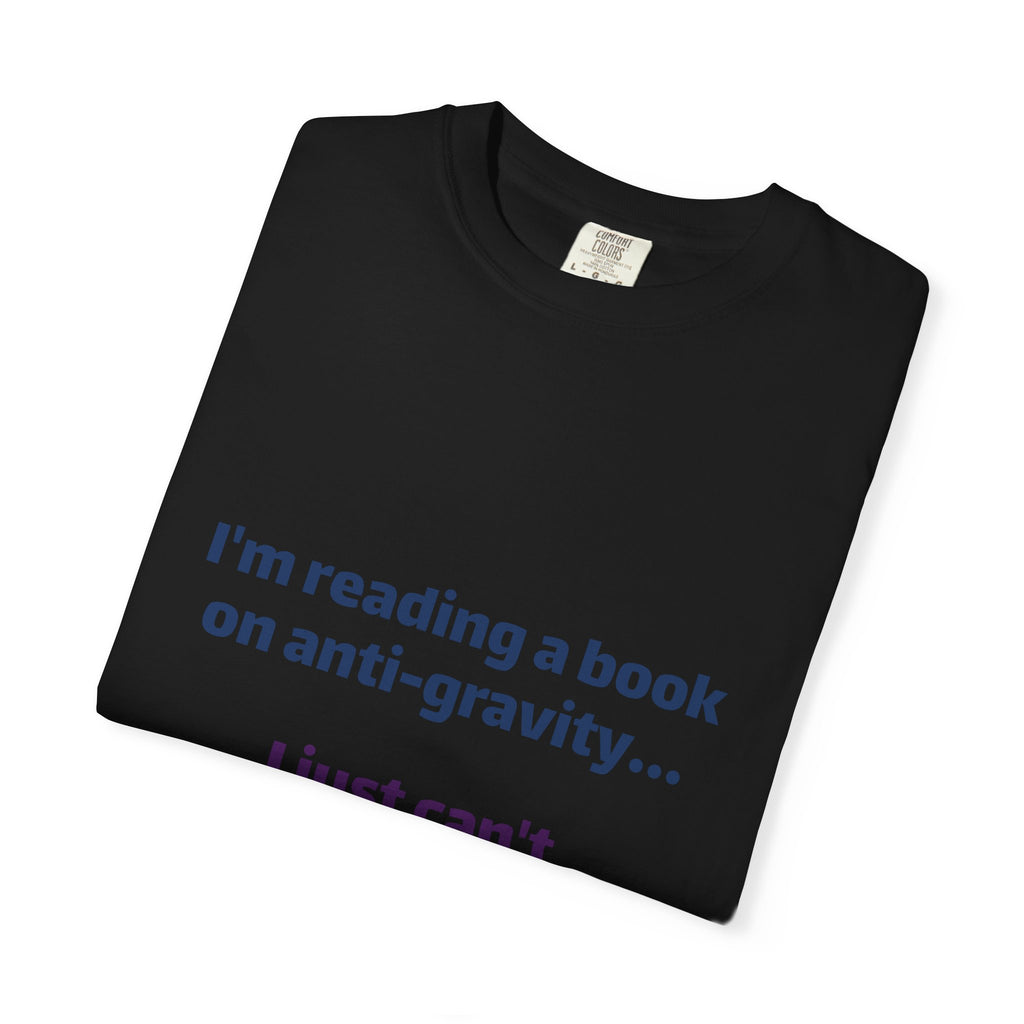 Humor Book Lovers T-Shirt — “I’m reading a book on anti-gravity… I just can’t put it down.”