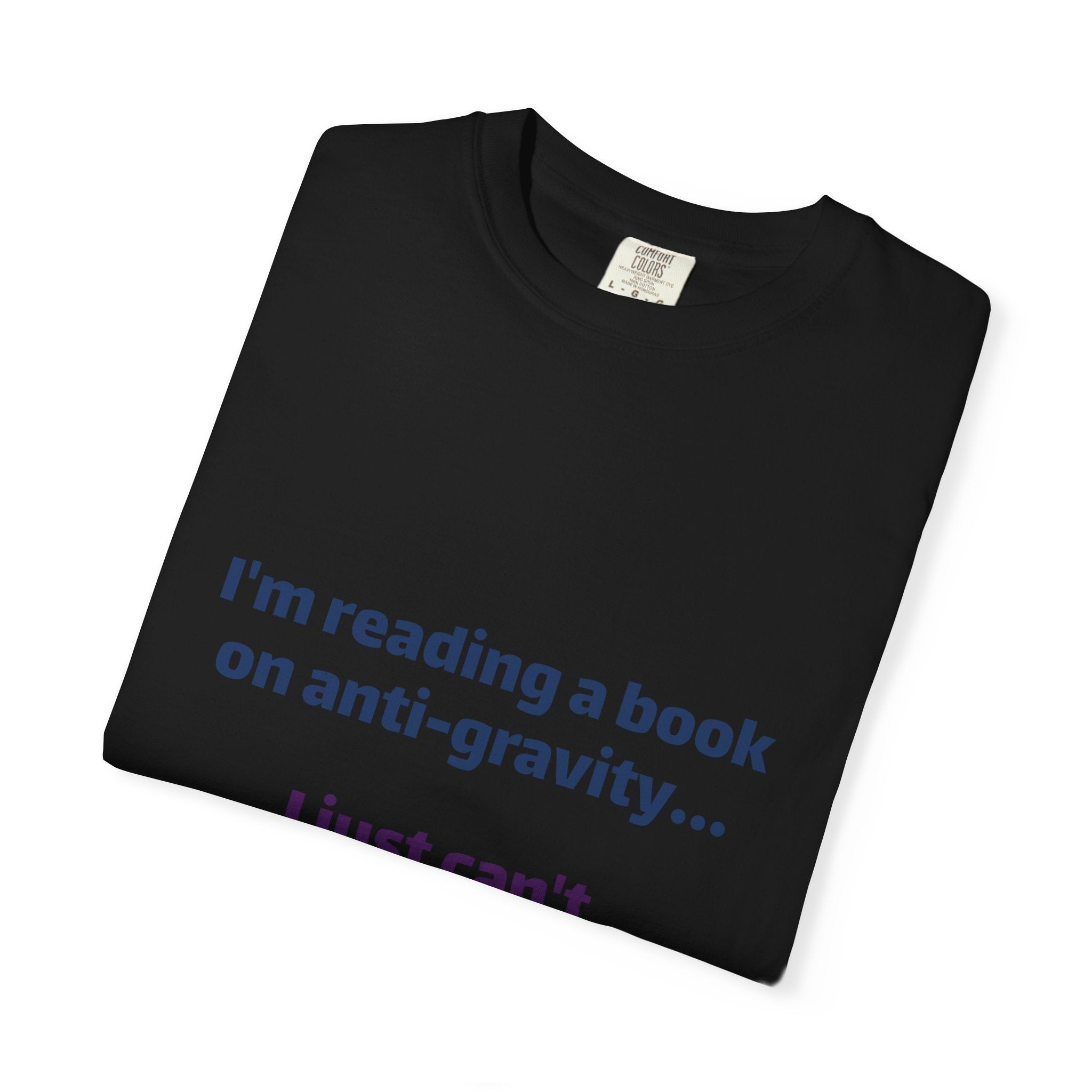 Humor Book Lovers T-Shirt — “I’m reading a book on anti-gravity… I just can’t put it down.”