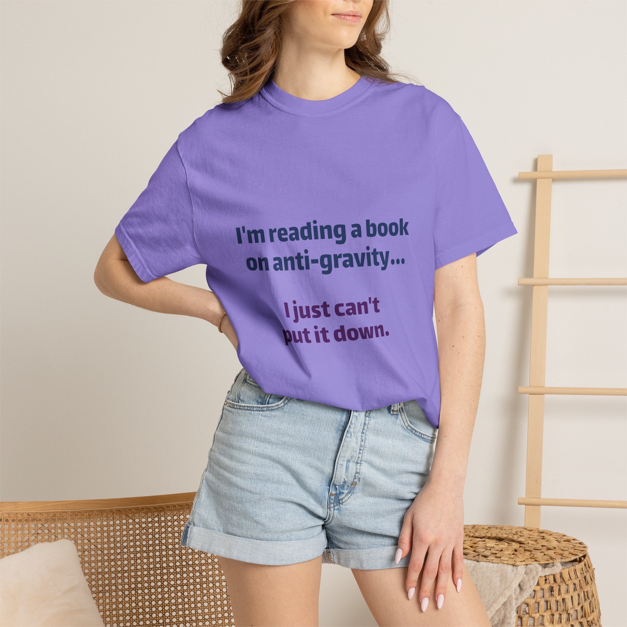 Humor Book Lovers T-Shirt — “I’m reading a book on anti-gravity… I just can’t put it down.”