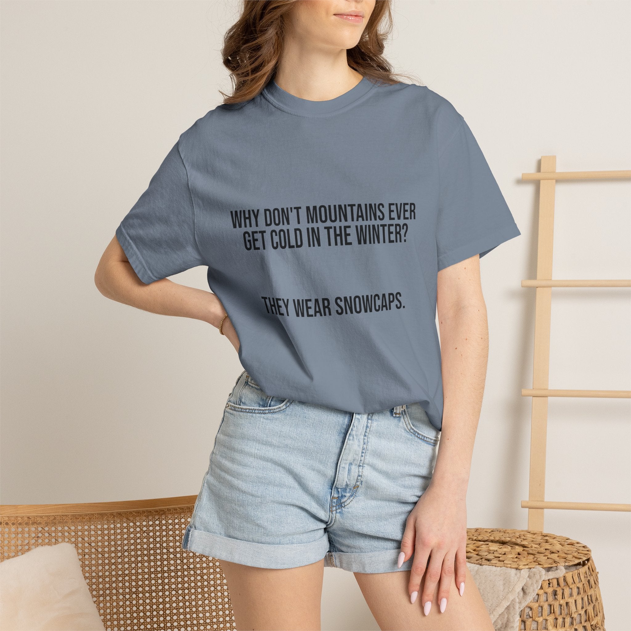 T-Shirt — "Why Don't Mountains Ever Get Cold in the Winter? They Wear Snowcaps." Funny Winter Mountain Tee